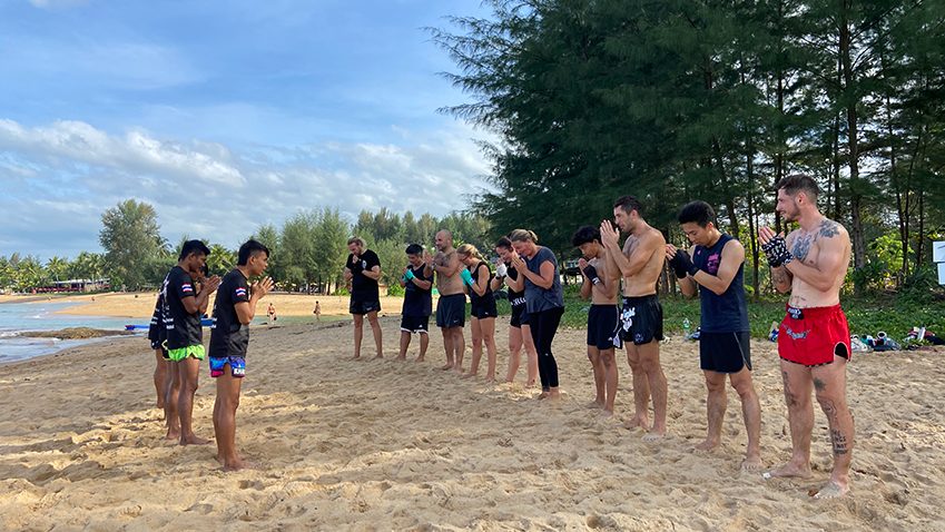 The camp lined up for the wai kru on the beach at Khao Lak